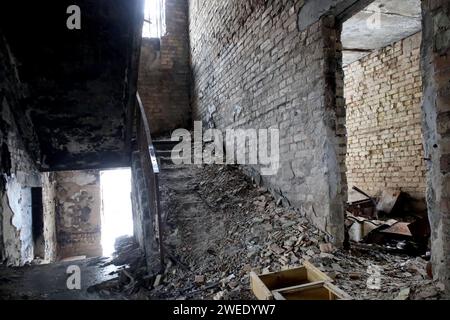 KYIV REGIN, UKRAINE - JANUARY 24, 2024 - The district court building damaged by Russian shelling, outside of which the ceremony of signing the Protocol for Cooperation in Reconstruction of the Borodianka District Court in Kyiv region took place, Borodianka, Kyiv region, north-central Ukraine. Stock Photo