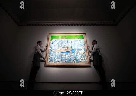 Gallery assistants hold 'California' by British artist David Hockney, which has not been seen in public for more than 40 years, on display at a photo call for highlights from the forthcoming 20th/21st Century London Evening Sale at Christie's in London. Picture date: Thursday January 25, 2024. Stock Photo