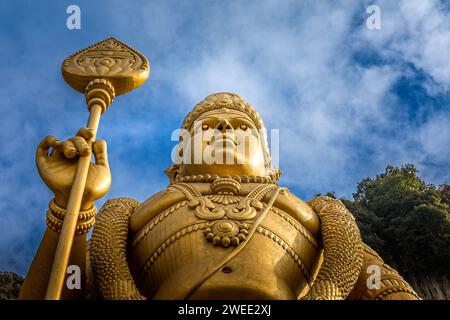 The golden buddha in front of the Batu Caves in Kuala Lumpur, Malaysia Stock Photo