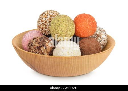A variety of different truffles in a wooden bowl Isolated on a white background Stock Photo