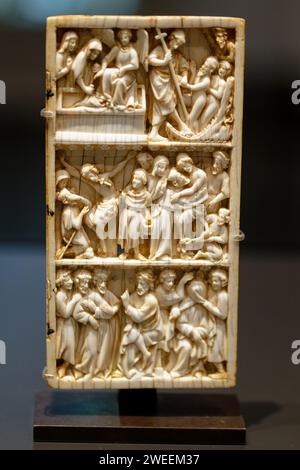 Cologne, Germany. 25th Jan, 2024. A wing of a diptych with scenes from the Passion of Christ, Paris (?) around 1280-1300 is on display at Museum Schnütgen. The two works are among the ivory carvings from France and Cologne from the 13th and 14th centuries that were newly acquired for the museum in 2023. Credit: Henning Kaiser/dpa/Alamy Live News Stock Photo
