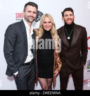 HOLLYWOOD, LOS ANGELES, CALIFORNIA, USA - JANUARY 24: James Lafferty, Barbara Alyn Woods and Bryan Greenberg arrive at the Los Angeles Premiere Of VMI Releasing's 'Junction' held at the Harmony Gold Theater on January 24, 2024 in Hollywood, Los Angeles, California, United States. (Photo by Xavier Collin/Image Press Agency) Stock Photo