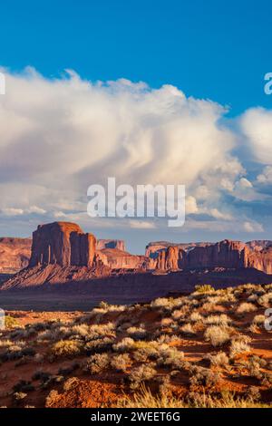 Clouds over Elephant Butte & Camel Rock,  sandstone monoliths in the Monument Valley Navajo Tribal Park in Arizona. Stock Photo