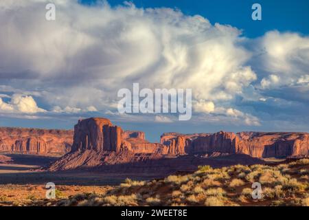 Clouds over Elephant Butte & Camel Rock,  sandstone monoliths in the Monument Valley Navajo Tribal Park in Arizona. Stock Photo