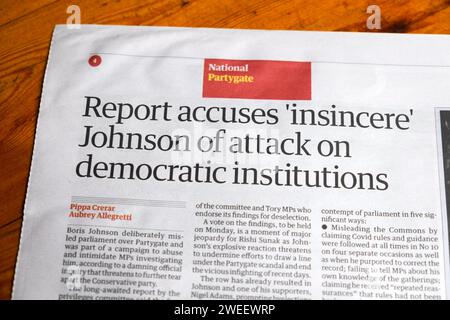 'Report accuses 'insincere' Johnson of attack on democratic institutions' Guardian newspaper headline Partygate article 16 June 2023 London England UK Stock Photo