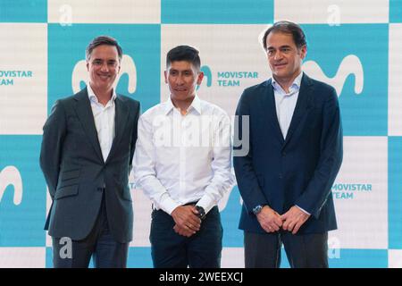 Alfonso Gomez the CEO of Telefonica Hispam (L), cyclist Nairo Quintana (C) and Fabian Hernandez CEO of Movistar Colombia (R), pose for a photo during Stock Photo