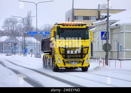 Beautifully customised new Volvo FH tipper truck at work for hauling cleared snow away from town to snow dump. Salo, Finland. January 21, 2024. Stock Photo