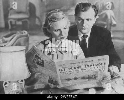 A portrait of Nigel Patrick and Ann Todd, who star in 'The Sound Barrier' (1952), a British drama film. In this cinematic work, directed by David Lean, Patrick plays Tony Garthwaite, an ambitious test pilot, while Todd portrays his wife, Susan Garthwaite, who must grapple with the dangers and emotional toll of her husband's profession. Stock Photo