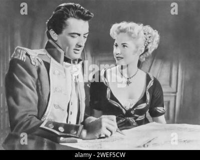 Gregory Peck and Virginia Mayo star in 'Captain Horatio Hornblower' (1951), a naval adventure film based on the novels by C.S. Forester. Peck plays Captain Horatio Hornblower, a courageous and skilled British naval officer during the Napoleonic Wars, while Mayo portrays Lady Barbara Wellesley, a strong-willed aristocrat and Hornblower's romantic interest. Stock Photo