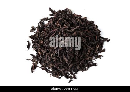 A handful of loose leaf tea in a pile isolated on a white background. View from above Stock Photo