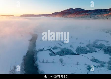 Beautiful Krka river near Dolenjske toplice in early morning hours on a spectacular winter day, just after snowfall, Dolenjske toplice, Slovenia Stock Photo