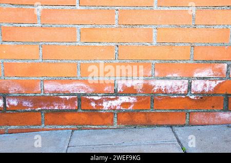 Rain water leaks on the wall causing damage at exterior Stock Photo