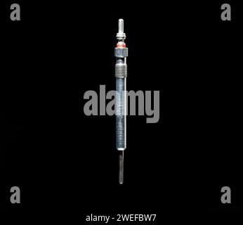 Modern glow plug with a ceramic rod for a diesel engine on a black ...