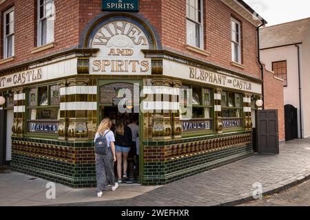 UK, England, West Midlands, Dudley, Black Country Museum, visitors entering Elephant and Castle pub Stock Photo