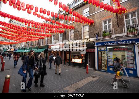 London, UK. 25th Jan, 2024. Colourful lanterns are hung above the streets of Chinatown for Chinese New Year, the Year of the Dragon. Credit: Stephen Chung/Alamy Live News Stock Photo