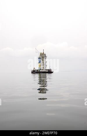 KivuWatt Power Station, owner ContourGlobal and executed with Wärtsilä, in Lake Kivu to extract methane gas and convert it to electricity Stock Photo
