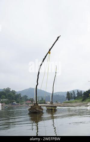 Traditional fishing vessels boats still used to fish on Lake Kivu often for sambaza (Limnothrissa miodon) a small fish resembling sardines Stock Photo