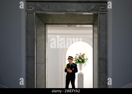 Warsaw, Poland, January 25, 2024. Serviceman of Marshal's Guard stand in the main entrance to Polish  Parliament plenary room during the 4th session of Polish Parliament that takes place amid chaos created by legal disagreement with the previous government. Current government took over the power in Poland December 13 2023, Taking over from the Law and Justice political party, who has ruled for 8 years. Both sides accuse each other of unconstitutional acts, and de facto two legal systems are present in the country. Credit: Dominika Zarzycka/ Alamy Live News Stock Photo