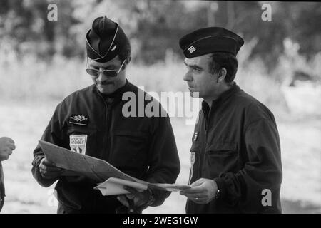Police officers (CRS) take part in a beat in Vaulx-en-Velin area