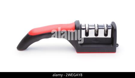 Manual new knife sharpening device isolated on white. Stock Photo