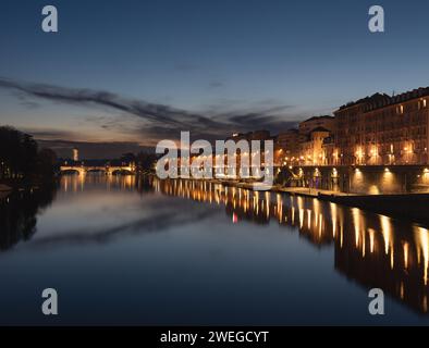 I Murazzi, famous, elegant, along the Torinese river, at sunset. Monviso in the distance adds a touch of magic. Stock Photo