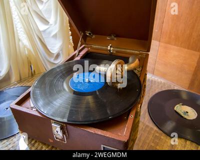 Sochi, Russia - February 12, 2023: Vintage mechanical gramophone with gramophone record Stock Photo