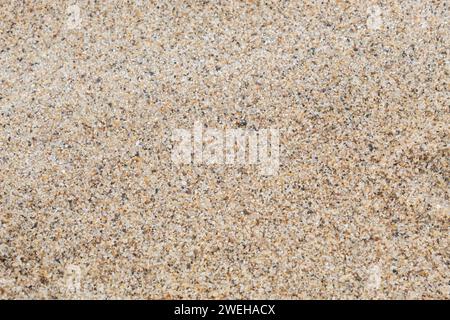 Macro photo of orange yellow beach sand grains Stock Photo