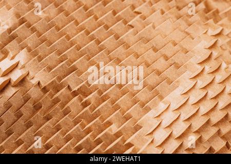 Sliced brown paper for packaging. Using recyclable materials. Background, texture. Stock Photo