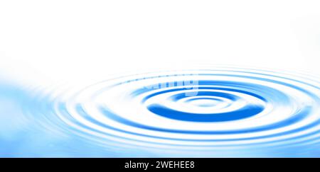 blue water surface with circular waves Stock Photo