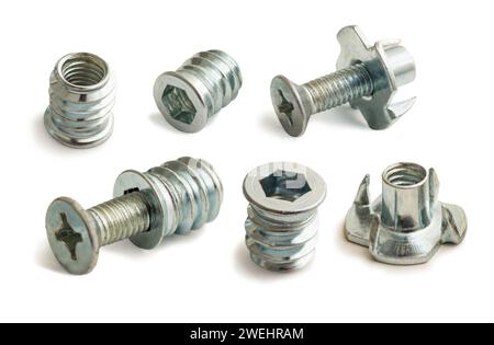 Fasteners, nuts, for assembling wooden furniture isolated on white background Stock Photo