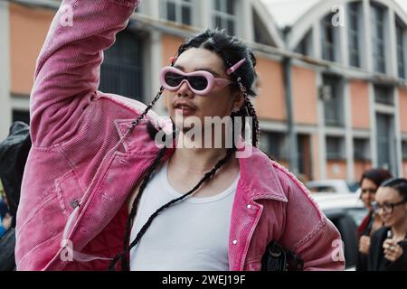 A guest outside ANNAKIKI show during Milan Fashion Week Womenswear Spring/Summer 2024. Stock Photo