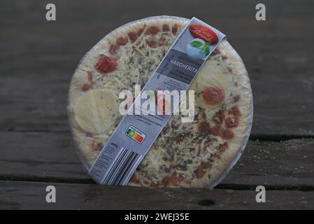 Brussels, Belgium. 25nd Jan, 2024. Pizza brand Casa Morando from Belgian supermarket. Juicy Mozzarella pizza with tomatoes and cheese. Semi-finished Stock Photo