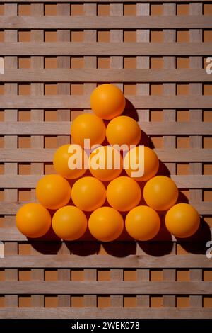 Abstract background with wooden grid and orange balls Stock Photo