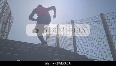 Image of media icon over african american man running on stairs outdoors Stock Photo