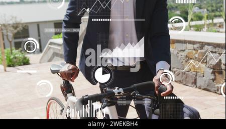 Image of data processing over african american businessman with bike Stock Photo