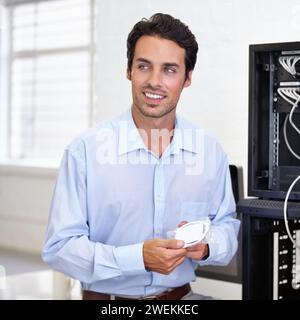 Man, it technician and fix server in office, connection or corporate worker or technology for electrical equipment. Businessman, workplace electronics Stock Photo