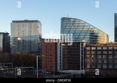 Urban landscape image including One Angel Square (Co-op building), 4 Angel Square, MeadowSide and New Century House in Manchester, UK Stock Photo