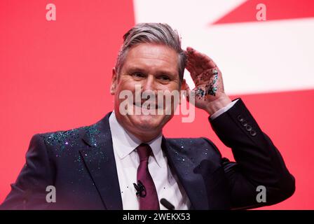 Sir Keir Starmer gives his keynote speech at the Labour Party Conference after Yaz Ashmawi took to the stage and poured glitter over him in protest. Stock Photo