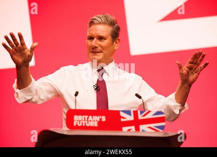 Sir Keir Starmer gives his keynote speech at the Labour Party Conference after Yaz Ashmawi took to the stage and poured glitter over him in protest. Stock Photo