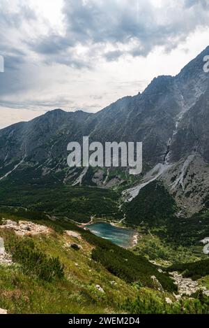 View to Zelene pleso lake from hiking trail to Jahnaci stirt in High Tatras mountains in Slovakia Stock Photo