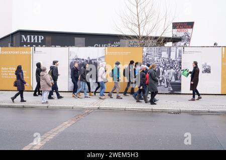 Tourists sightseeing checkpoint charley Berlin Germany Stock Photo