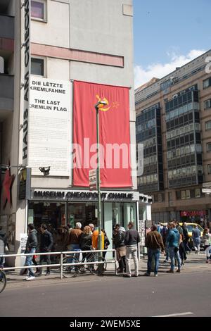 Tourists sightseeing checkpoint charley Berlin Germany Stock Photo