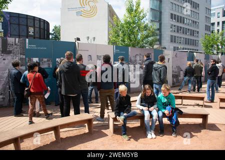 Tourists sightseeing checkpoint charley Berlin Germany Stock Photo