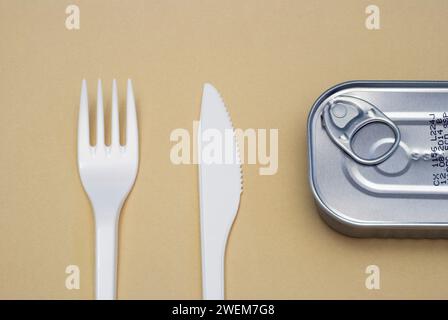 plastic cutlery and tin can Stock Photo