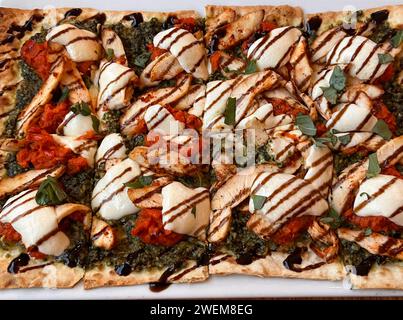 Chicken Margherita pizza with balsamic drizzle Stock Photo