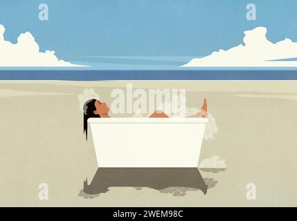 Carefree woman enjoying bubble bath in bathtub on sunny ocean beach Stock Photo