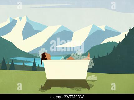 Carefree woman enjoying bubble bath in scenic, remote mountains Stock Photo