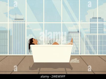 Carefree woman enjoying bubble bath in bathtub with cityscape view Stock Photo