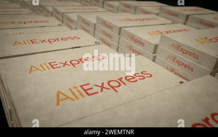 Poznan, Poland, January 25, 2024: AliExpress Alibaba group online retail box production line. E-business chinese company. Cardboard pack factory. Abst Stock Photo