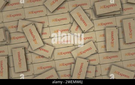 Poznan, Poland, January 25, 2024: AliExpress Alibaba group online retail box production line. E-business chinese company. Cardboard pack factory. Abst Stock Photo